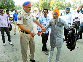 Pal Singh who tried to commit suicide in front of the Deputy Commissioners office at Ropar on Monday. 
