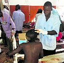 A student is treated in a hospital in Potiskum, Nigeria, on Monday. 