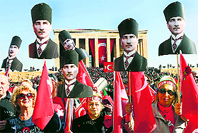 People attend a ceremony on the death anniversary of Turkish Republics founder Mustafa Kemal Ataturk in Ankara on Monday.