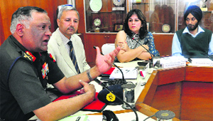 The Chief of Staff, Western Command, Lt Gen V Menon (left), with Principal Controller of Defence Accounts GS Sood and Additional Principal Controller of Defence Accounts Shivalli Chouhan during the annual accounts officers conference in Chandigarh on Tuesday. 