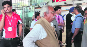 Passengers enquire about the flight details at the Chandigarh airport on Tuesday.
