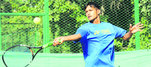 CHART trainee Shashikant Rajput in action during the CLTA-AITA Championship Series U-16 Tennis Tournament at Sector 10 in Chandigarh on Tuesday.