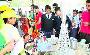 Students interact with visitors during the 41st Jawaharlal Nehru National Science, Mathematics and Environment Exhibition at Leisure Valley, Sector 10, in Chandigarh on Tuesday.