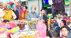 Chief Minister Virbhadra Singh, along with CPS ID Lakhanpal, Rajender Rana and Anita Verma, on his way to the Shiva temple in Hamirpur on Tuesday.