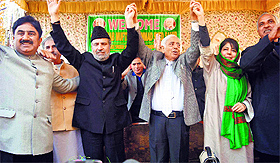 PDP patron Mufti Mohammad Sayeed with his daughter and party chief Mehbooba Mufti in Anantnag district on Tuesday. 