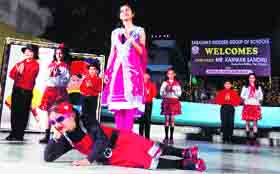 Students performing during the annual day and prize distribution function of Saraswati Modern Group of School.