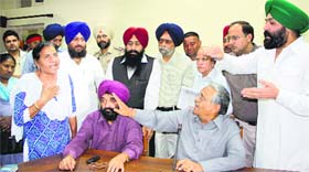 A victim talks to officials of the Claims Commission in Jalandhar on Tuesday