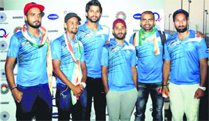 Indian hockey team members on their arrival at the Indira Gandhi International Airport in New Delhi on Tuesday after winning the series in Australia. 