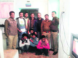 Policemen with the three accused at Chakrata in Dehradun district on Tuesday