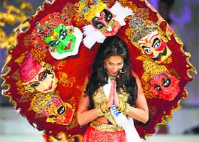 Indian beauty: Miss India Jhataleka Malhotra displays the traditional consume during the Miss International Beauty Pageant in Tokyo on Tuesday