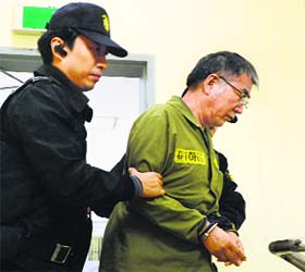 Lee Joon-seok, captain of the sunken Sewol ferry, arrives at a court in Gwangju