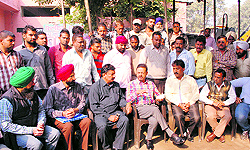 Members of the Municipal Corporation Workers Union at a meeting with officials of the MC in Amritsar on Wednesday