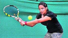 Fourth seed Jannat Khurana in action during a tennis match at the CLTA courts in Sector 10, Chandigarh, on Wednesday. 