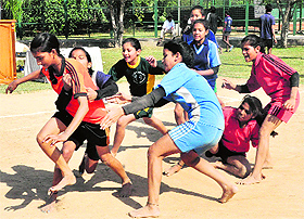 Girls of the GMHS, Mani Majra, and the GHS, Dhanas, in action duirng the Inter-School Kabaddi Tournament at the sports complex in Sector 42, Chandigarh, on Wednesday. 