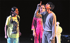 Artistes enact a scene from a play, "The Boy Who Stopped Smiling", at Tagore Theatre in Chandigarh on Wednesday. 