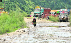 A potholed road at Mendali on the Rohru-Hartkoti stretch. Photo: Amit Kanwar 