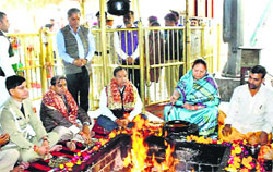 Governor Urmila Singh performs a puja at the Brajeshwari temple in Kangra on Wednesday. Photo: Ashok Raina 