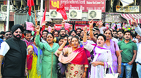 Bank employees protest in Jammu on Wednesday. 