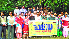 Members of the Teachers Guild, J&K, at a meeting in Jammu on Wednesday. 