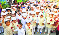 Tiny tots celebrate Childrens Day at St Xaviers School in Ludhiana on Wednesday. Photo: Inderjeet Verma