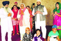 Dr Rajinder Kaur Dhindsa with a Sikh family at Seoul, South Korea. A file photograph
