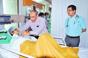 AIIMS doctors inspect a victim at a hospital in Bilaspur.