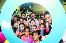 Children peep through the diabetes ring at the PGI on Thursday