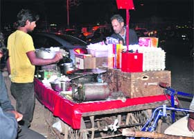 A food vendor uses a stove in Sector 22, Chandigarh, on Thursday