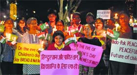 Students take out a candlelight march for Indo-Pak peace at Sector 17 in Chandigarh on Thursday