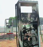 A fuel station damaged by arsonists in Hathin on Tuesday.