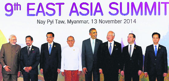 Prime Minister Narendra Modi with other leaders at a group photo session during the 9th East Asia Summit at Naypyitaw in Myanmar on Thursday. PTI 