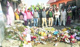 Safai karamcharis protest at Sanjay Nagar in Jammu on Thursday