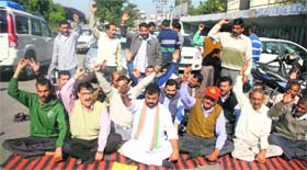 Narayan Dutt Tripathi, BJP leader from Billawar, and his supporters protest in Jammu on Thursday