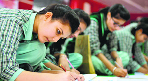 Students take part in a poster-making competition at Green Land Senior Secondary Public School