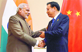 PM Narendra Modi with Chinese Premier Li Keqiang during a meeting at Naypyitaw in Myanmar on Thursday