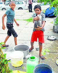 Child labourers at work in front of the DCs office in Jalandhar