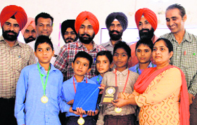 Winners of the District Students Science Congress being felicitated at Teachers Home in Bathinda on Friday.