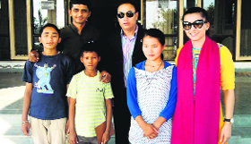 Snehalaya inmates Bire, Kammar Bahun and Sangita Tamang with officials of the Nepalese Embassy while on their way back home to Nepal.