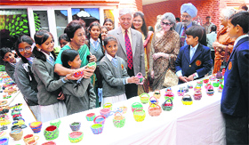 Students display their clay models to former Army Chief Gen VP Malik (centre), his wife Ranjana Malik (4th from left), school principal Vandana Saxena, former Chief Justice of the Allahabad High Court Justice SS Sodhi (2nd from right) and his wife Mrs Bonny Sodhi (3rd from right) at Tribune Model School, Sector 29, Chandigarh on Friday.