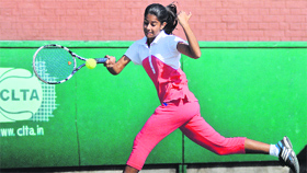 Seerat Pannu returns a shot during a match at the CLTA courts in Sector 10, Chandigarh, on Friday.