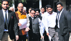 Activists of NGO Helpline submit a memorandum to the Police Commissioner in Jalandhar on Friday. Tribune Photo: Malkiat Singh