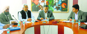 SC Aggarwal, state Chief Commissioner, Right to Service Commission, chairs a meeting in Fazilka on Friday.