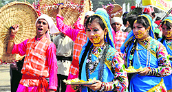 Artistes perform during the inauguration of the Kauthik Cultural Fest at Parade Ground in Dehradun on Friday