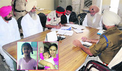 Police take the statement of the father of the deceased, Karamjit Singh; and (inset) Amandeep Kaur who committed suicide with her two children in Bathinda on Saturday. Tribune photo: Pawan Sharma