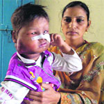 Mohit Kumar with his mother in Bathinda. a Tribune photograph