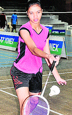 A player returns a shot during a match at Panjab University in Chandigarh on Saturday