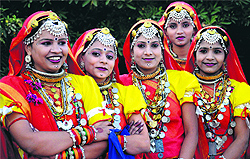 Girls dressed in traditional attire at Kala Gram in Chandigarh on Saturday