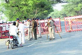 Police personnel deployed at Barwala, 1 km from Satlok Ashram, in Hisar district on Saturday