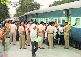 The police send Rampal followers back from the railway station in Jind on Saturday