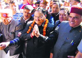 Union Health Minister JP Nadda being welcomed in Solan on Saturday. MP Virender Kashyap (right) and Dr Rajeev Bindal (left) are also seen in the picture